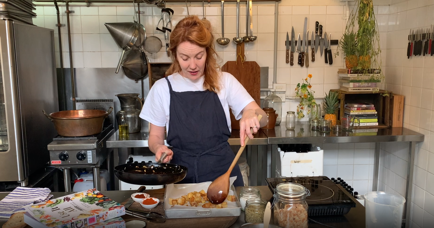 Cornersmith's Alex Elliot-Howery making croutons out of old bread